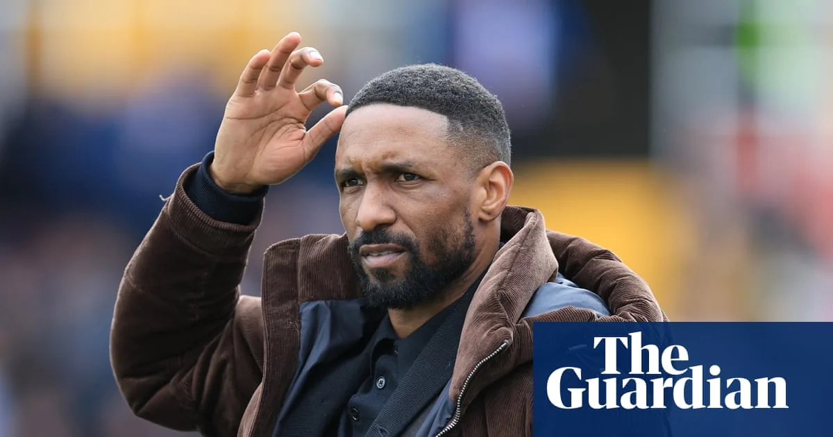 Woking director claims Defoe missed meeting and training before exit image 1