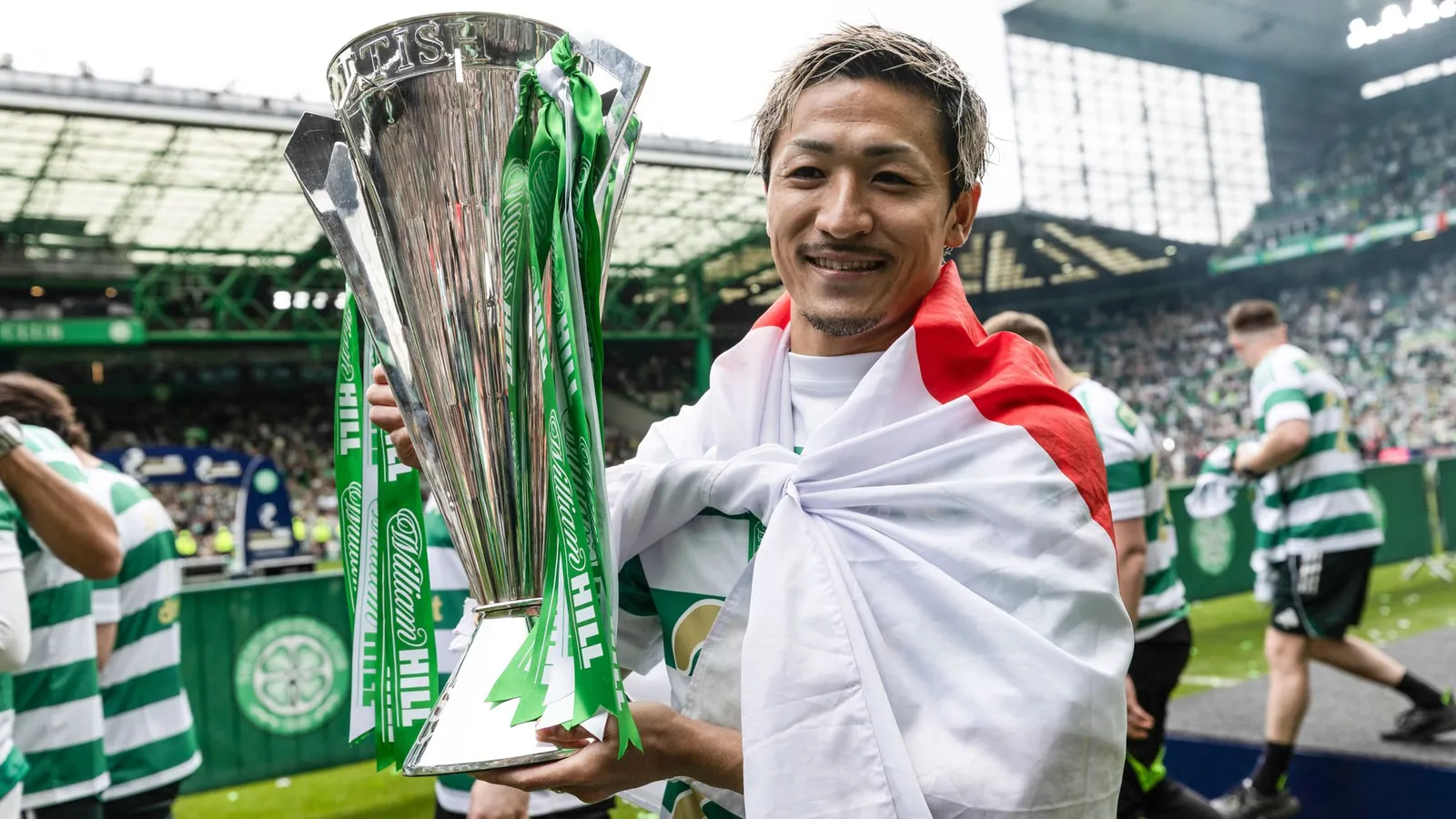 GLASGOW, SCOTLAND - MAY 16: Celtic's Daizen Maeda with the trophy during a William Hill Premiership match between Celtic and Heart of Midlothian at Celtic Park, on May 16, 2026, in Glasgow, Scotland. (Photo by Craig Williamson / SNS Group)