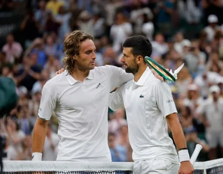 Novak Djokovic and Stefanos Tsitsipas embrace